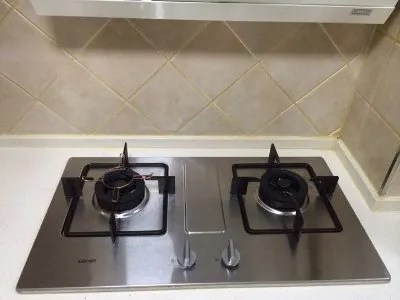 上海港华紫荆燃气灶维修电话--公如聚服务网点