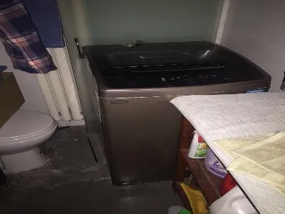 滚筒洗衣机排污口堵塞怎么拆开(图1) 滚筒洗衣机排污口堵塞怎么拆开(图1)