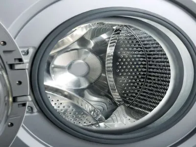 把小纸块掉进洗衣机桶外面怎么办(图1)